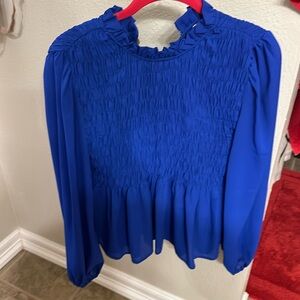 Smocked long sleeve top